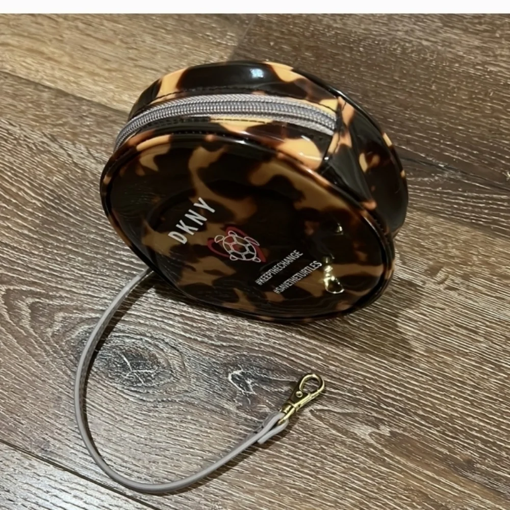 DKNY save the turtle wristlet in excellent condition